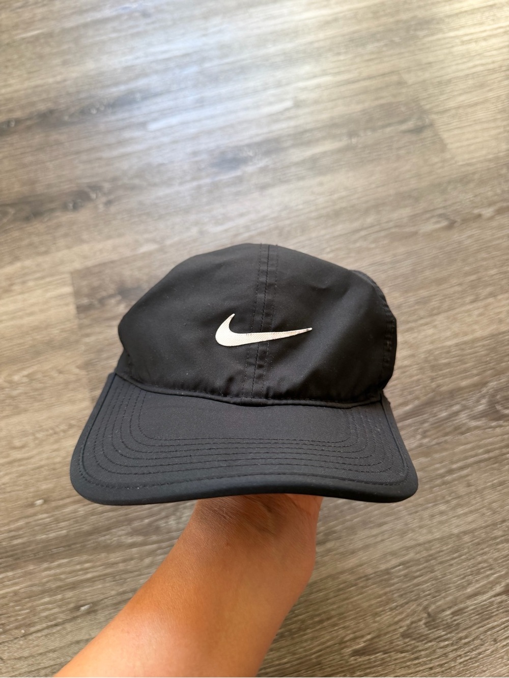 Nike Black Cap with White Swoosh Logo